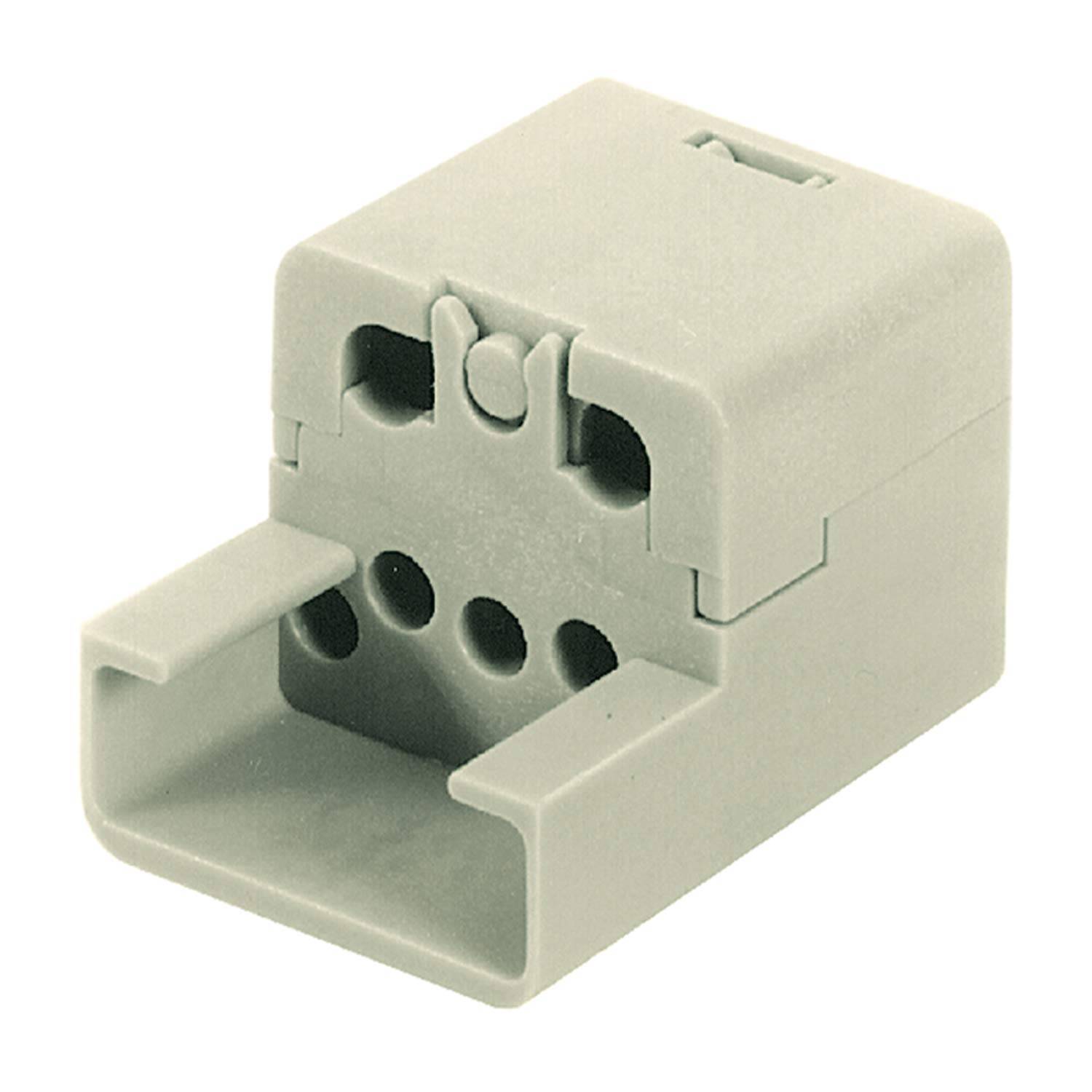 Eine beige Elektroverteilerdose mit mehreren Schlitzen und Öffnungen, die zum Verbinden und Organisieren von Leitungen in Installationen verwendet wird.