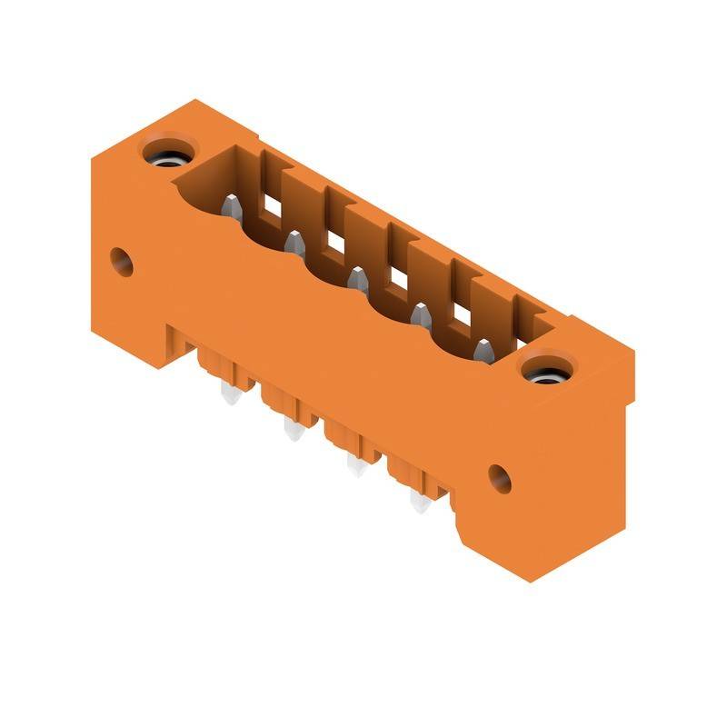 Ein orangefarbener elektronischer Anschlussblock mit mehreren hervorstehenden Pins, der in Schaltungsanordnungen verwendet wird.