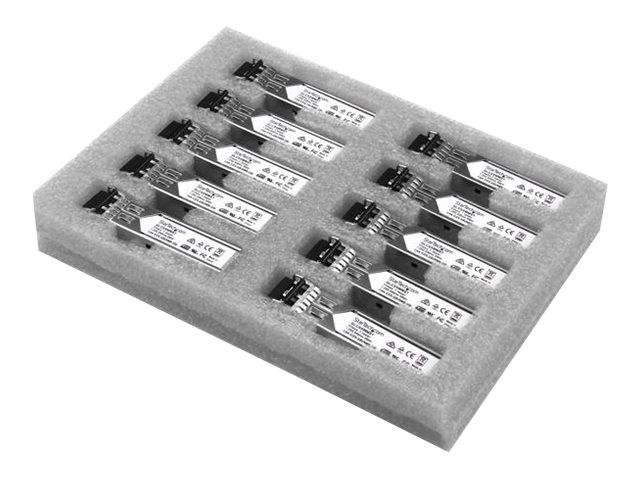 Schaumstoffablage mit zehn kleinen elektronischen Modulen oder Sensoren in Reihen auf weißem Hintergrund angeordnet.