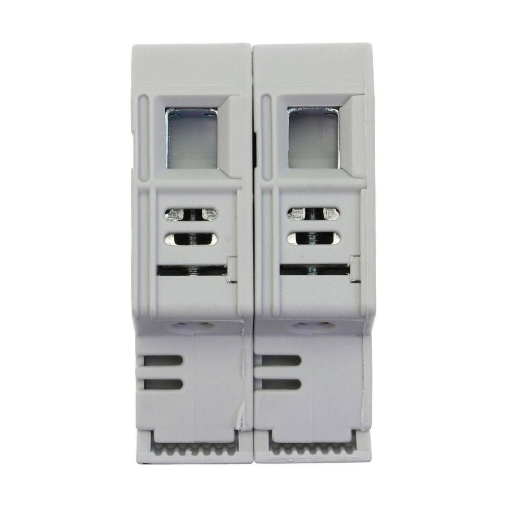 Zwei rechteckige elektrische Komponenten mit offenen Schlitzen und einer kleinen sichtbaren internen Mechanik, nebeneinander positioniert.