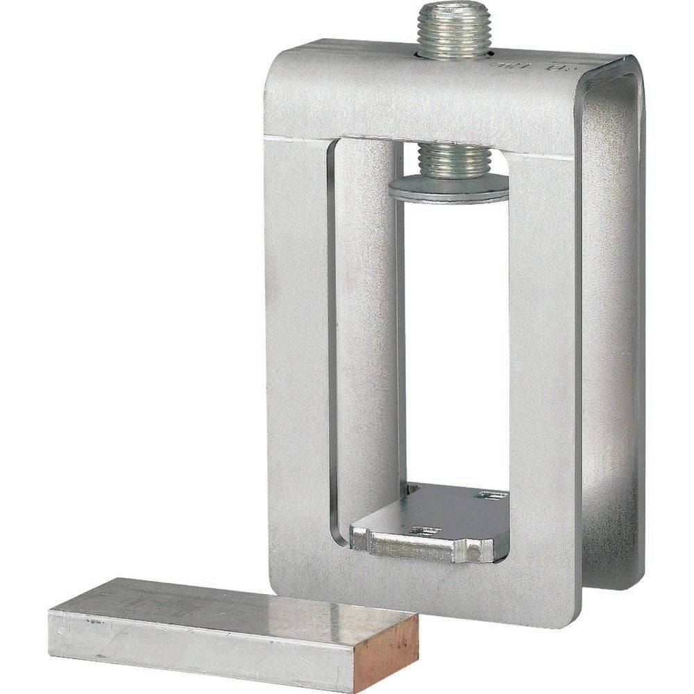 Metallpressmaschine mit einem rechteckigen Block daneben, die zum Formen von Materialien verwendet wird.