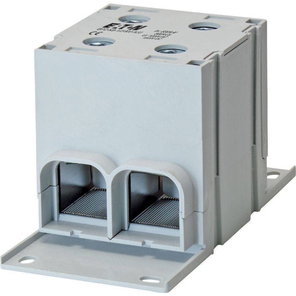 Eine weiße elektrische Komponente mit zwei Metallsteckern an der Basis, quadratisch geformt mit sichtbaren Schrauben auf der Oberseite, verwendet für Stromverbindungen.