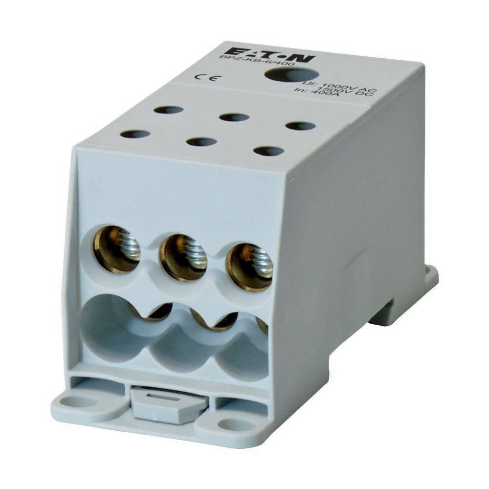 Eaton MPE Klemmenblock mit Löchern und Kupferverbindungen, verwendet für elektrische Installationen, in heller Graufarbe dargestellt.