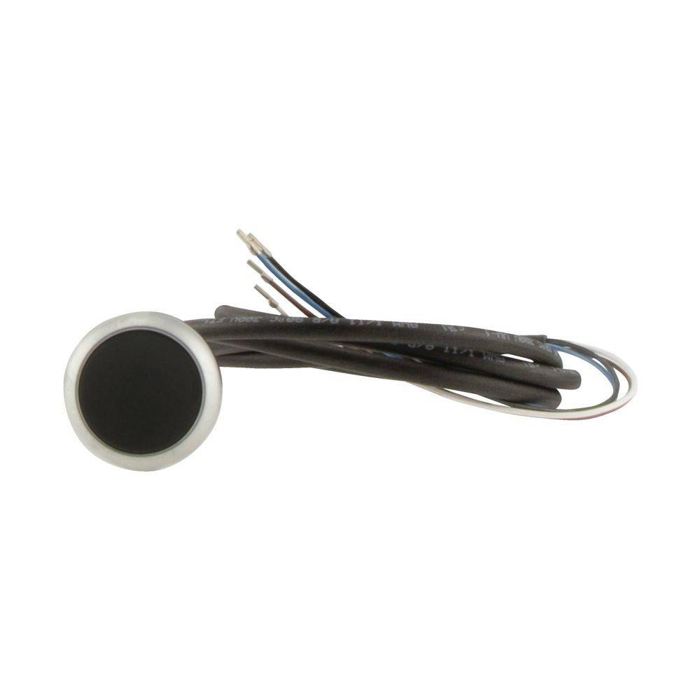 Ein kleiner runder elektronischer Sensor mit angeschlossenen Kabeln, der zur Erkennung von Objekten oder Veränderungen in der Umgebung verwendet wird.