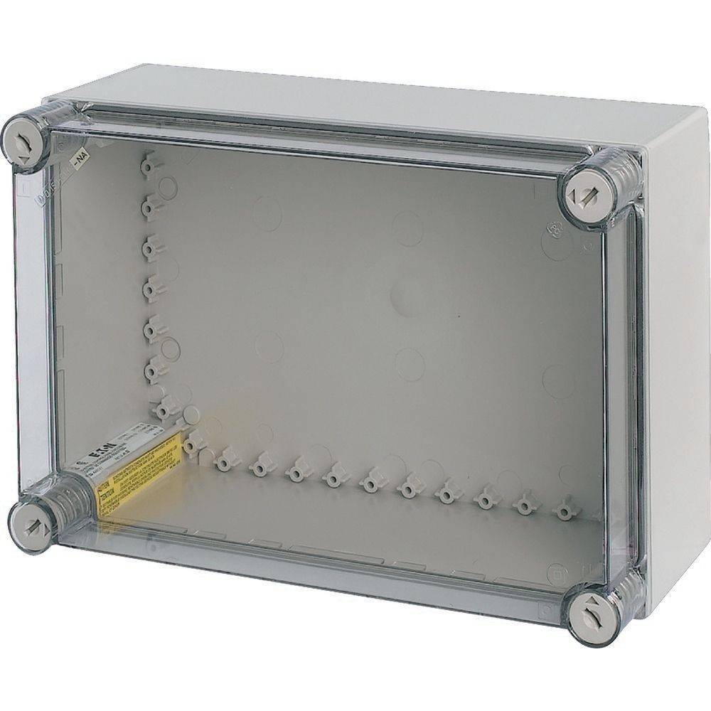 Transparente Kunststoff-Elektroverteilerdose mit sichtbaren Befestigungslöchern, geeignet zum Unterbringen und Schützen von elektrischen Verbindungen in Innenräumen.