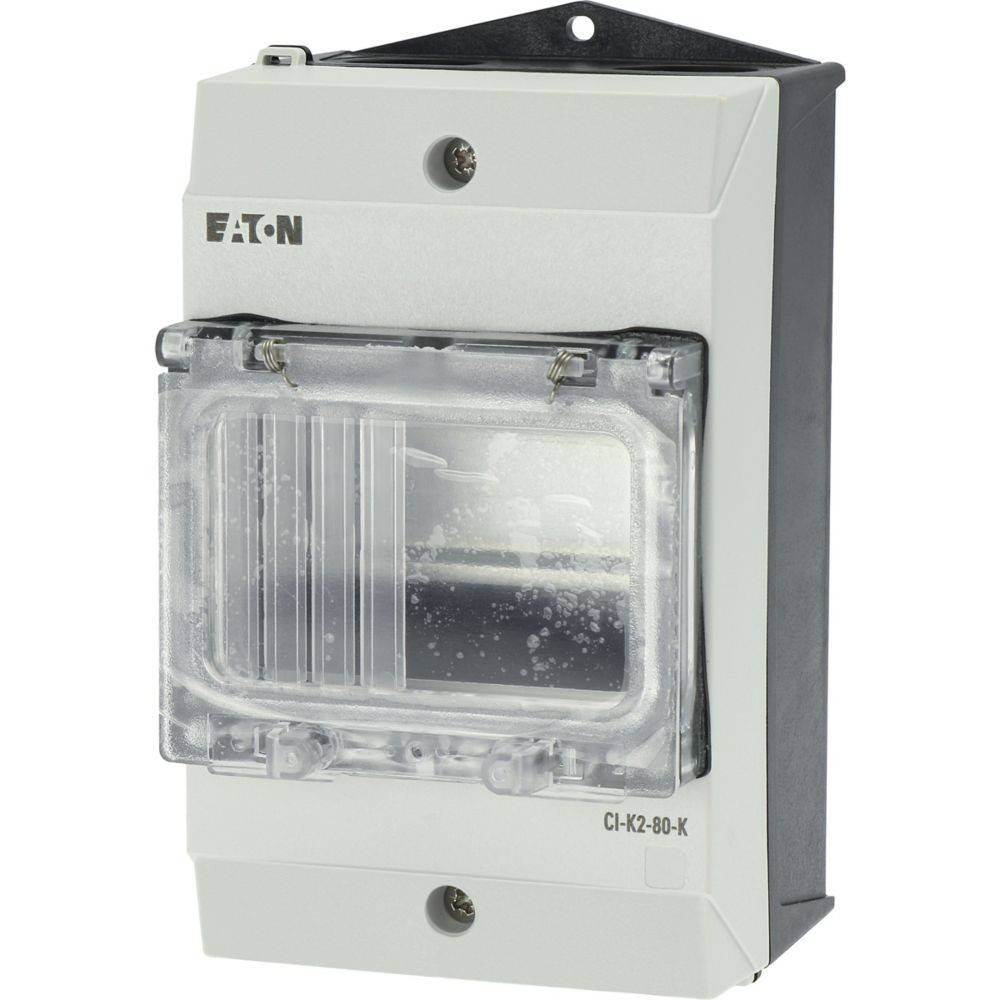 Eine weiße, wandmontierte elektrische Komponente mit transparenter Abdeckung, beschriftet mit 'Eaton' und 'CI-K2-80-K'.