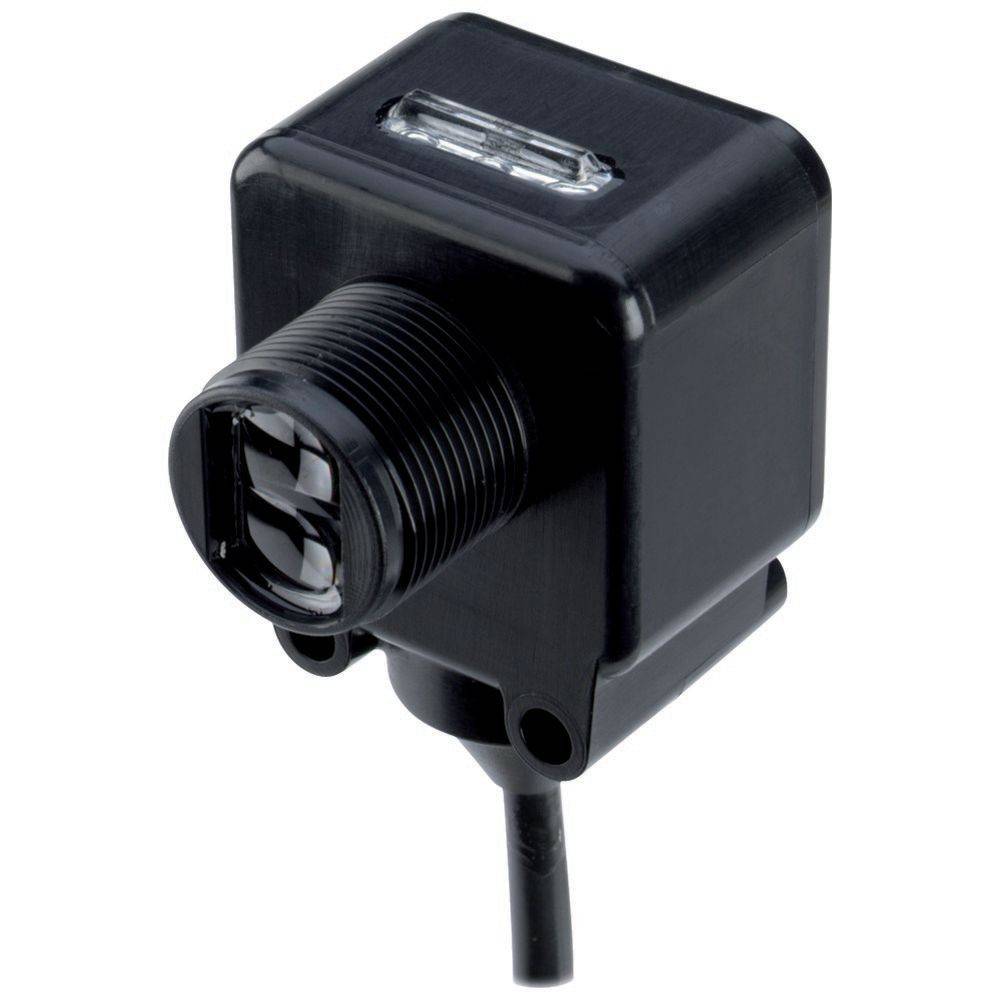 Ein schwarzer, quadratischer industrieller Sensor mit einer Linse und einem angeschlossenen Kabel, der wahrscheinlich zur Erkennung oder Messung von Umweltfaktoren verwendet wird.
