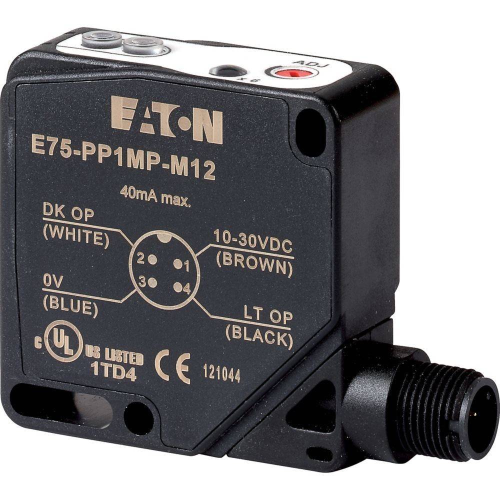 Ein schwarzer Eaton-Sensor mit dem Modell 'E75-PP1MP-M12' mit Anschlusspunkten, die wie folgt beschriftet sind: DK OP (weiß), 0V (blau), 10-30VDC (braun), LT OP (schwarz).