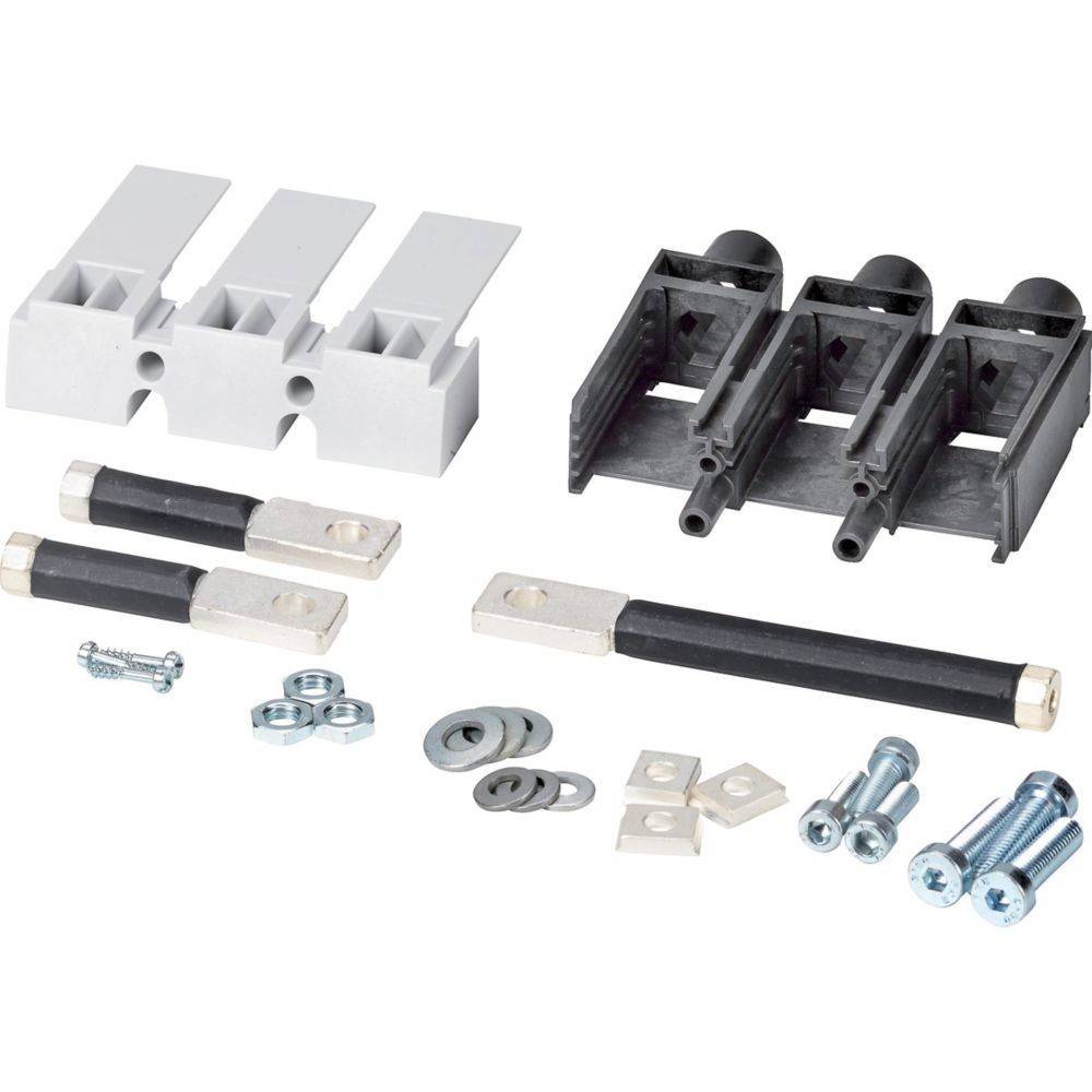 Elektrischer Anschlusskit mit drei grauen Klemmenblöcken, einem schwarzen Sicherungshalter, Metallsicherungen, Schrauben, Unterlegscheiben und Muttern.