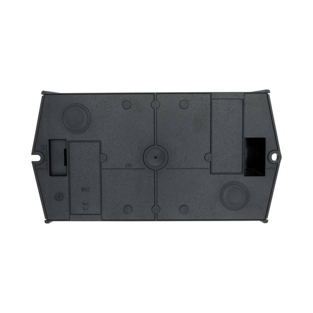 Eine schwarze, rechteckige Kunststoffkomponente mit geometrischen Mustern und Schlitzen, von oben betrachtet; höchstwahrscheinlich ein Teil eines elektronischen Geräts.