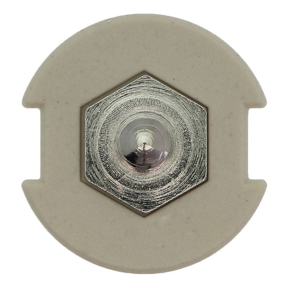 Eine Nahaufnahme eines metallischen Schraubenkopfes mit sechseckigem Design, eingebettet in ein beiges kreisförmiges Gehäuse, möglicherweise verwendet in mechanischen Baugruppen.