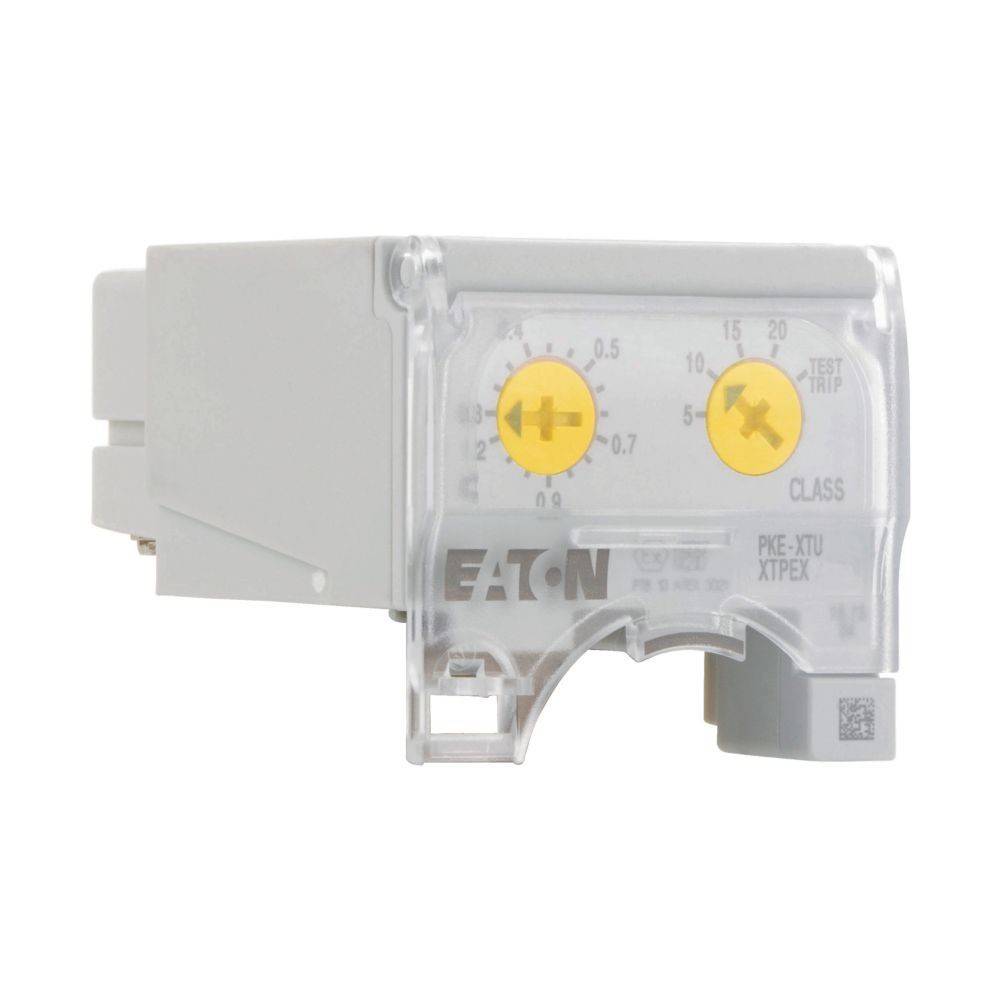 Elektrisches 'Eaton'-Gerät mit verstellbaren Drehschaltern, die mit 'Test' und 'Klasse' beschriftet sind und der elektrischen Schutzvorrichtung dienen. Graues Gehäuse mit durchsichtiger Abdeckung.