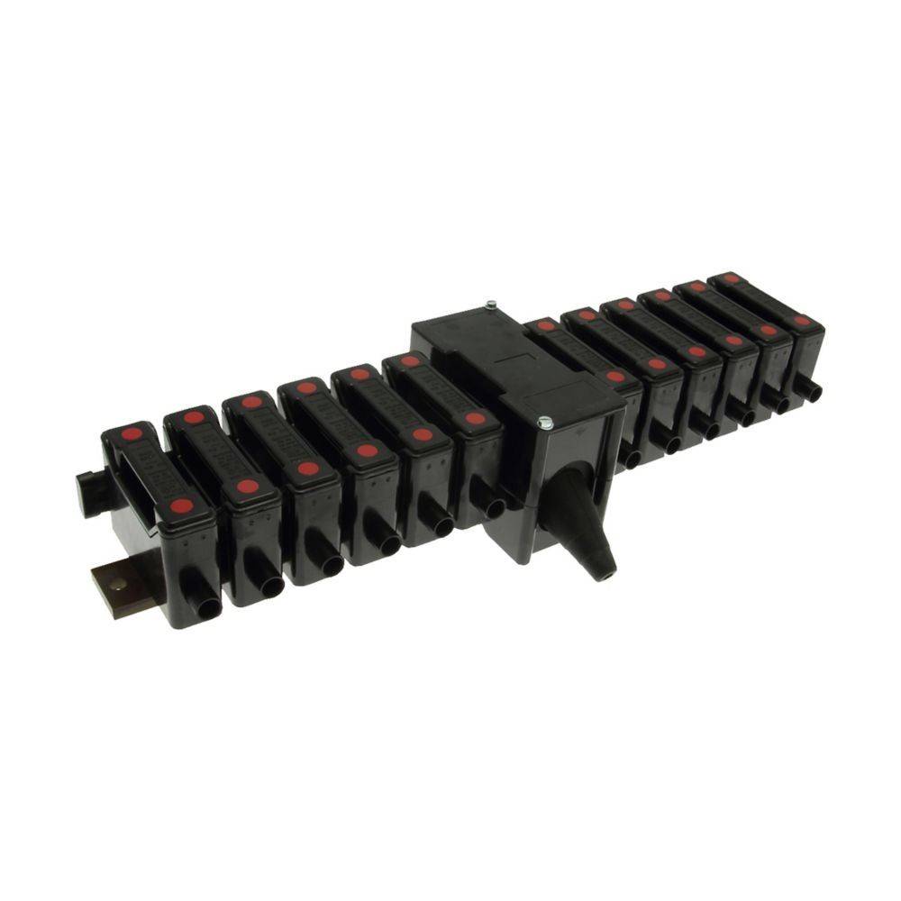 Eine schwarze elektrische Komponente mit mehreren Anschlüssen und roten Punktindikatoren, die zur Steuerung und Verteilung elektrischer Energie verwendet wird.