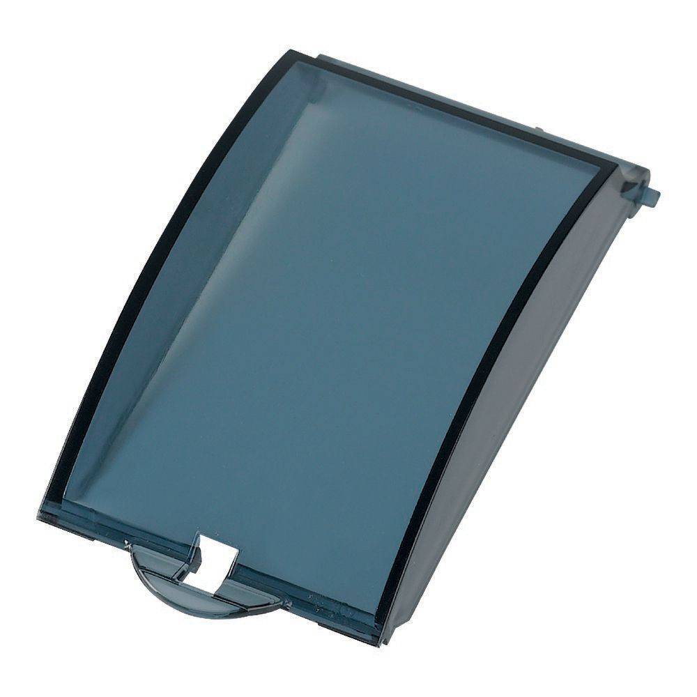 Eine geschwungene, transparente blaue Plastikabdeckung mit einem kleinen Verschluss an der Unterseite, höchstwahrscheinlich ein Teil eines elektronischen Geräts oder einer Maschine.