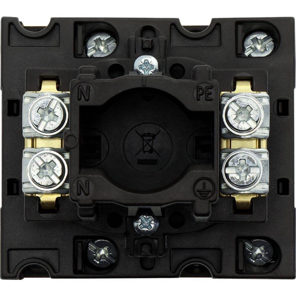 Eine Nahaufnahme eines Lichtschalter-Mechanismus mit verschiedenen Schrauben, beschriftet mit N, PE und Erdungssymbolen, die elektrische Anschlüsse anzeigen.