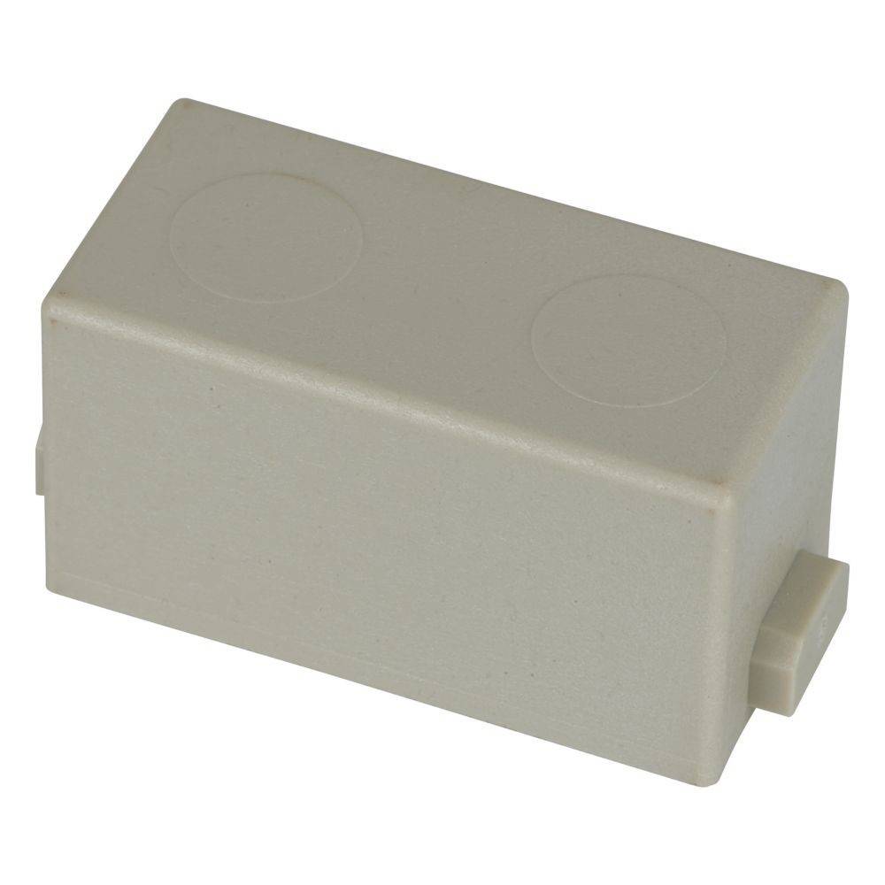Eine beige Kunststoff-Elektronikgehäuse mit zwei kreisförmigen Vertiefungen auf der Oberseite und einem kleinen Vorsprung an der Seite.