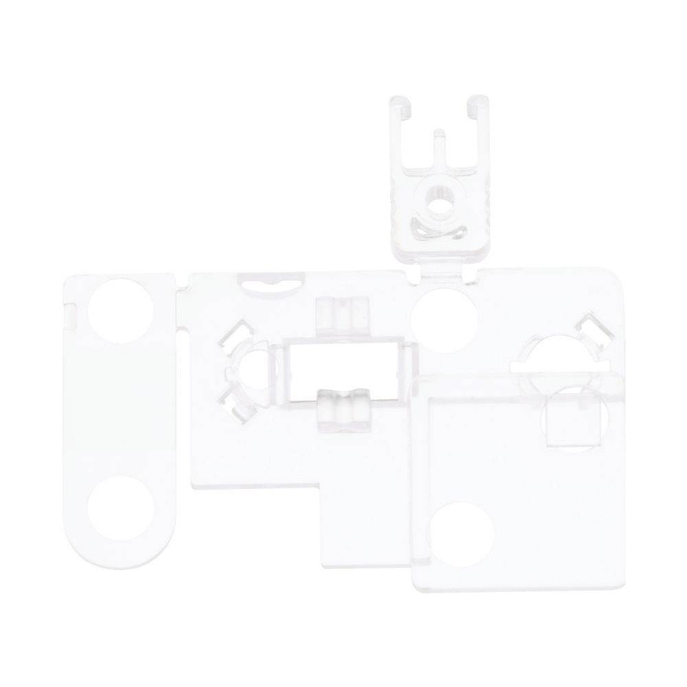 Transparente Plastikkarte mit Ausschnitten und verschiedenen geometrischen Formen; möglicherweise eine Vorlage oder Schablone für Designzwecke.