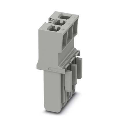 Ein grauer Anschlussblock-Verbinder mit mehreren Anschlussslots, der in der Elektrotechnik verwendet wird, um Drähte sicher zu verbinden.