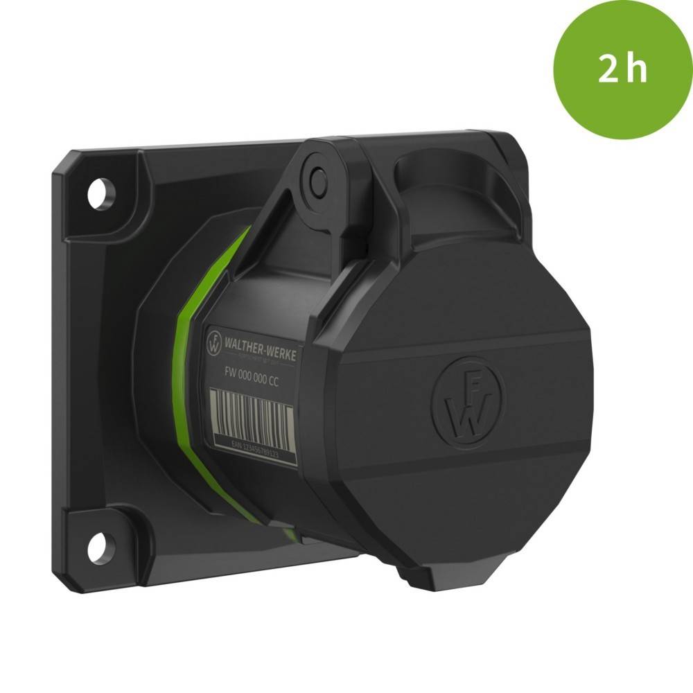 Eine schwarze elektrische Wandsteckdose mit einem Schutzdeckel und grünem Akzent, gekennzeichnet mit '2h' in einem grünen Kreis, was auf Zeit oder Bewertung hinweist.