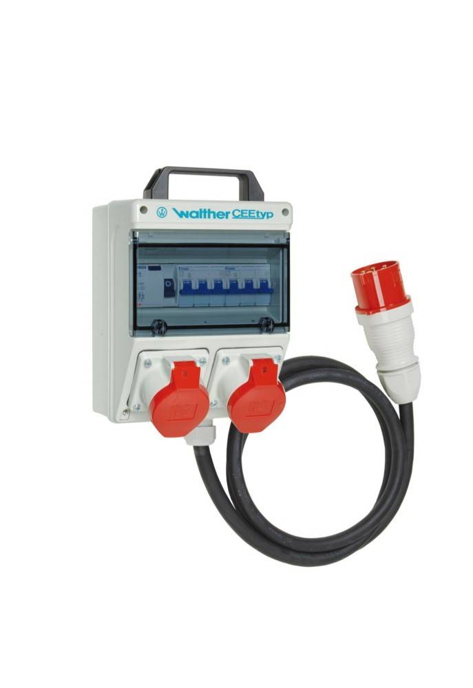 Elektrische Verteilerbox des Typs 'Walther CEEtyp' mit zwei roten Steckdosen und einer Kabelschleife, verwendet für industrielle Stromverbindungen.