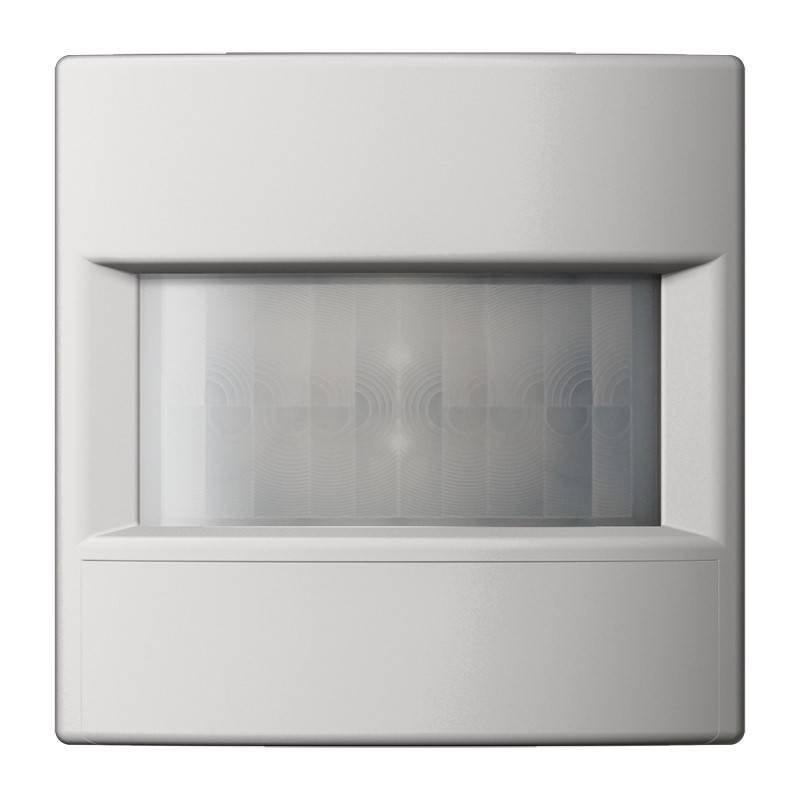 Weiße wandmontierte Bewegungsmelder mit rechteckiger, matter Mitteltafel, wahrscheinlich für automatische Beleuchtung oder Sicherheitserkennung.