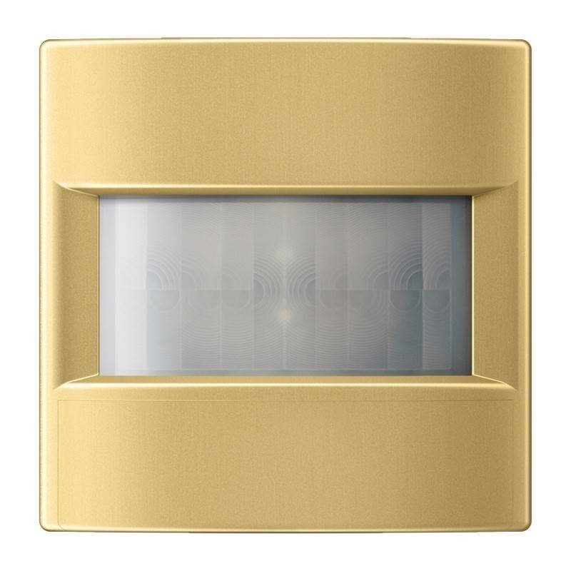 Goldenes quadratisches Wandlicht oder Sensorpanel mit rechteckigem Mattglasfenster in der Mitte.