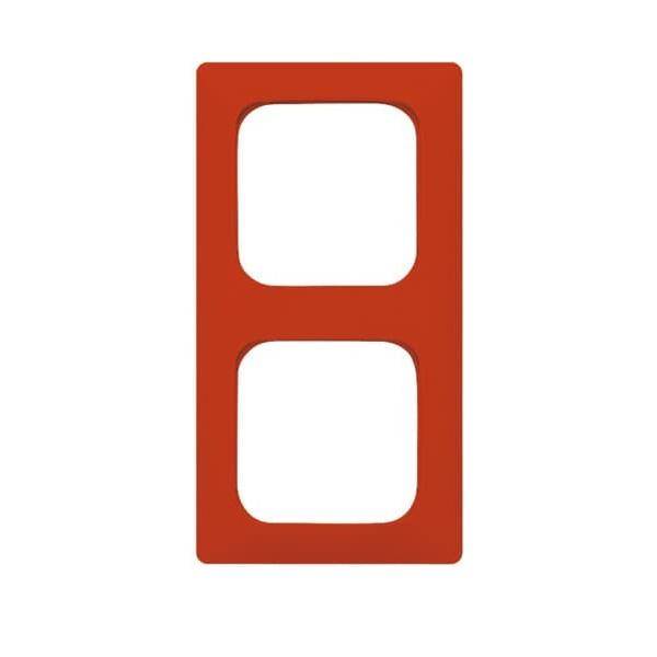 Roter rechteckiger Rahmen mit zwei leeren Aussparungen für Schalter oder Steckdosen.