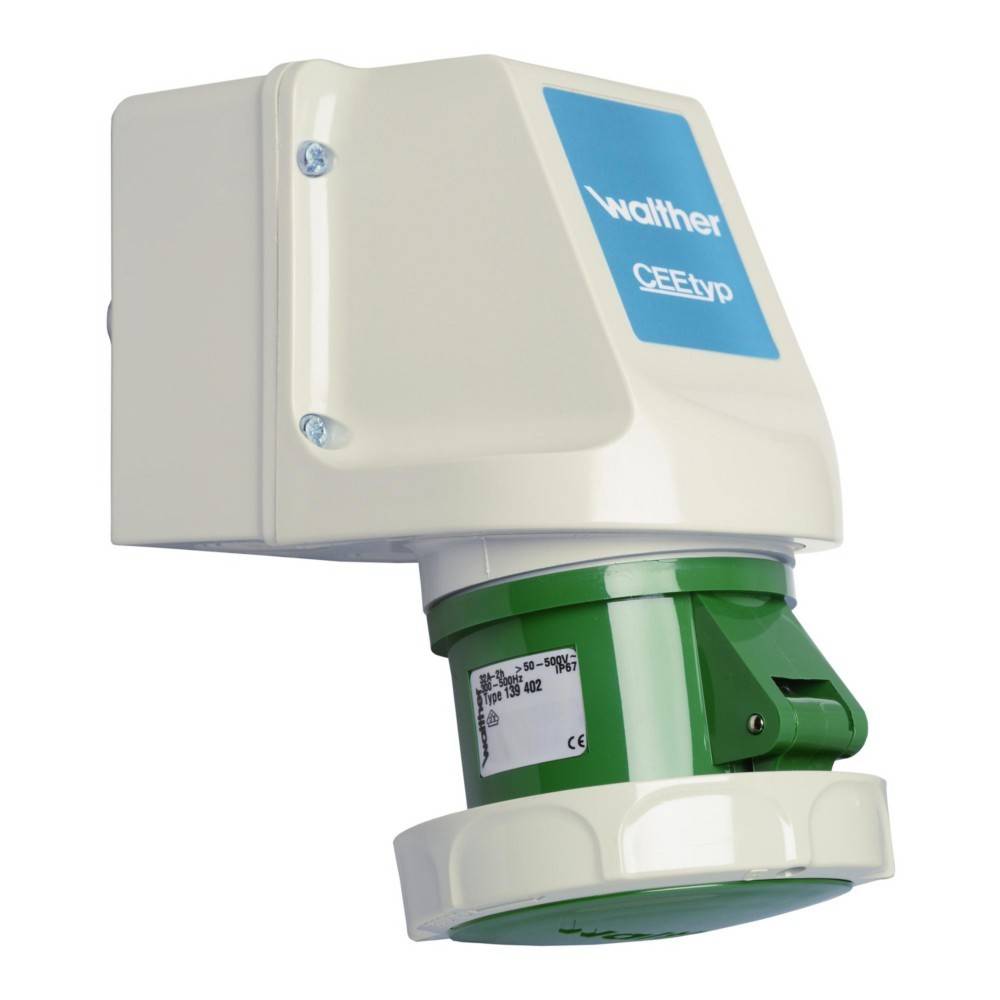 Eine weiße und grüne elektrische Steckdose mit einer blauen Beschriftung 