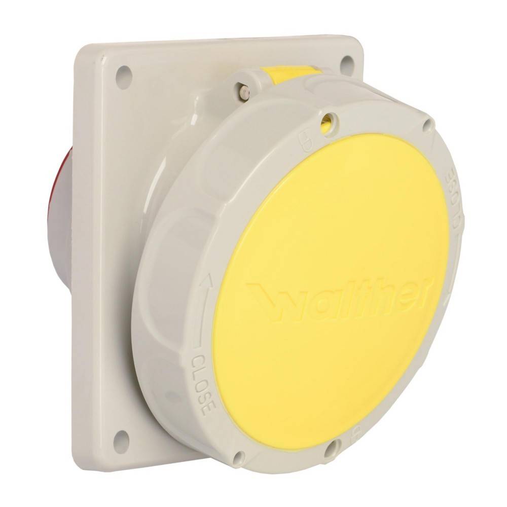 Eine Walther Industrie-Wandsteckdose mit gelber, runder Abdeckplatte und grauem Gehäuse, von vorne links gesehen.