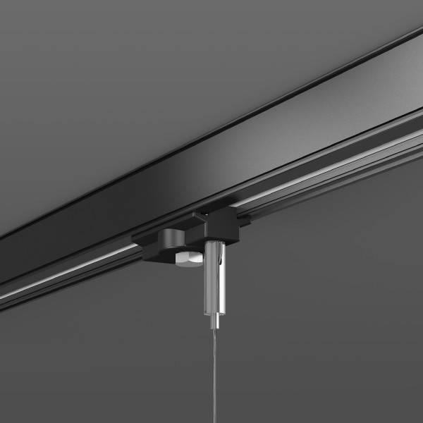 Nahaufnahme einer an der Decke montierten Schiebespur mit einem kleinen hängenden Sensor oder Zugschnur, die ein minimalistisches Hardware-Detail zeigt.