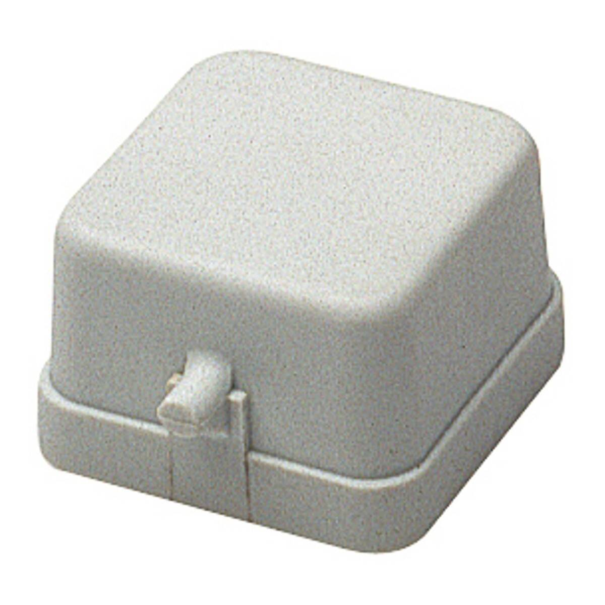 Eine quadratische, hellgraue mechanische Tastenkappen auf einer Basis, die üblicherweise in Tastaturen verwendet wird.