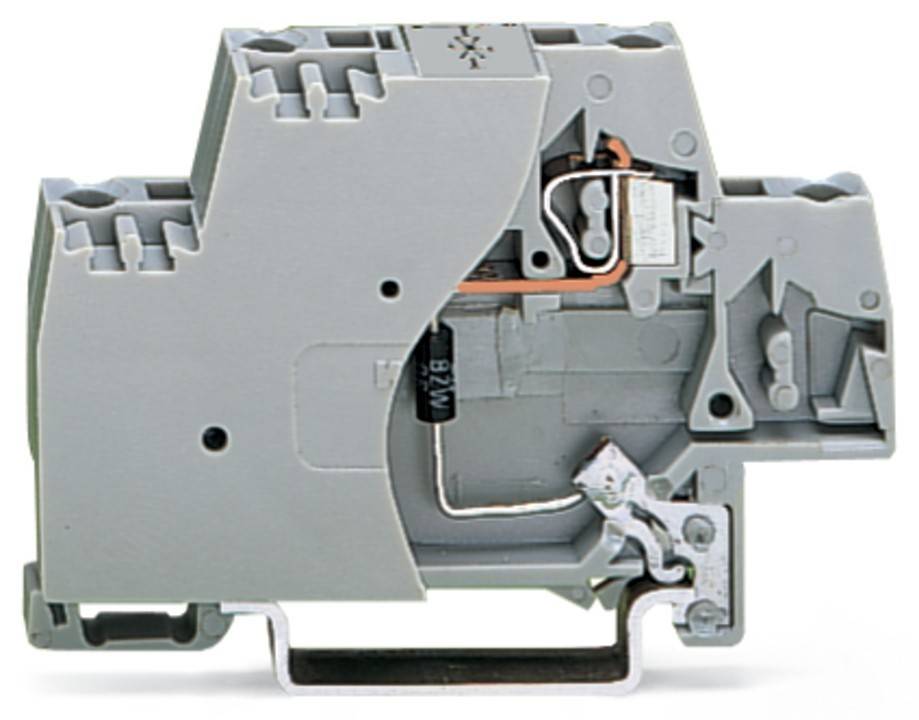 Nahaufnahme eines grauen elektrischen Klemmenblocks mit sichtbaren Innenkomponenten und Anschlüssen, montiert auf einer Metallschiene.