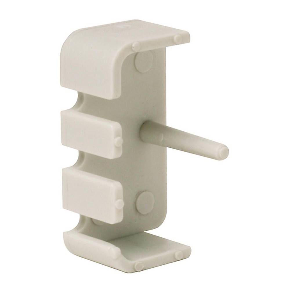 Eine kleine, weiße Plastikklammer mit drei Schlitzen und einem vorstehenden Stift, wahrscheinlich zum Organisieren oder Befestigen von Kabeln verwendet.