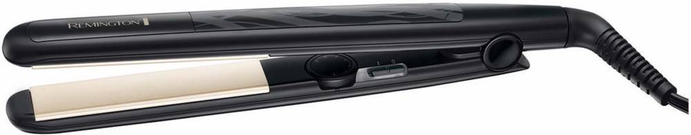 Ein Nahaufnahmebild eines schwarzen Gasherdsteuerungspanels, das einen runden Drehknopf und einen Schieberegler zeigt, beide mit Zahlen für präzise Einstellungen versehen.