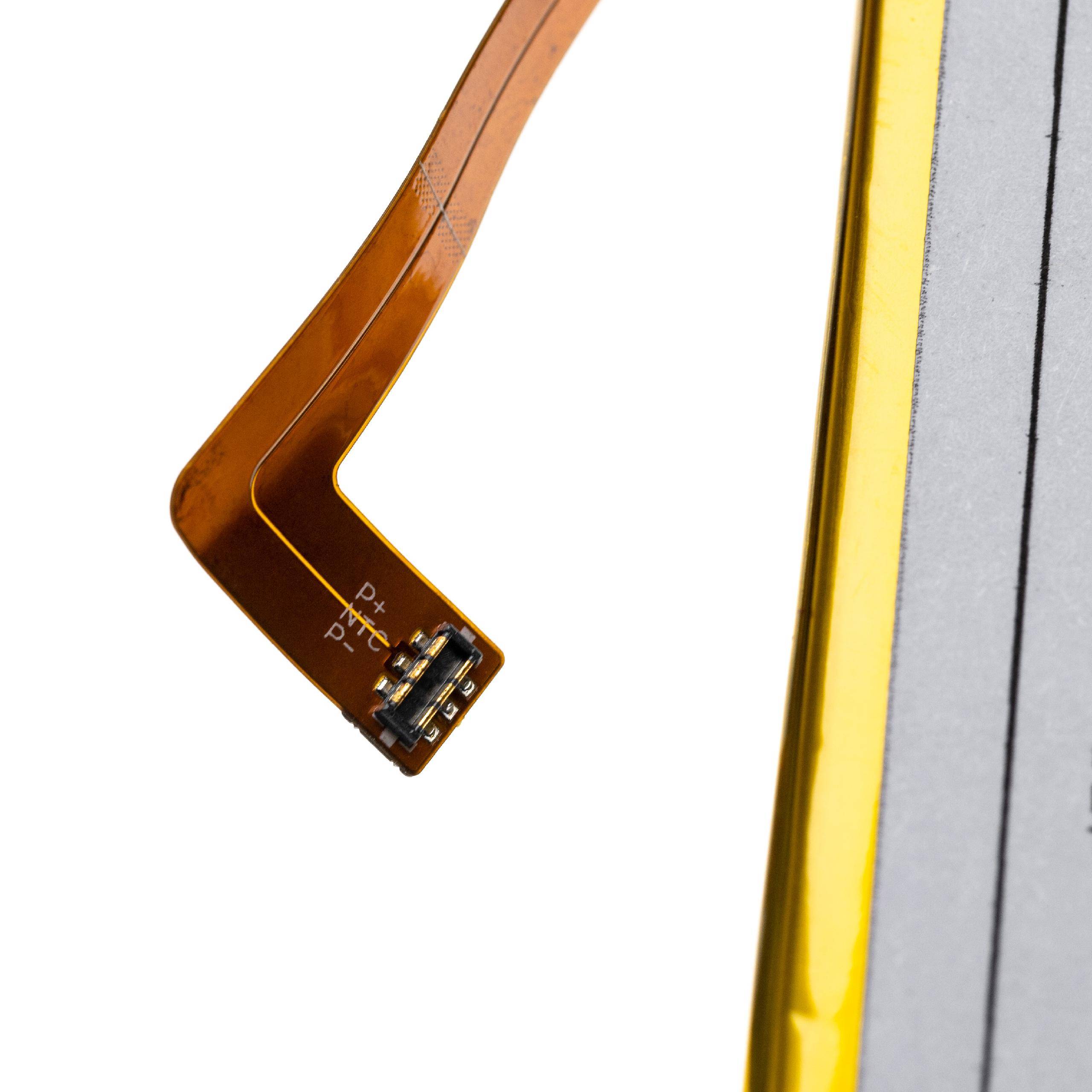 Nahaufnahme eines gebogenen flexiblen Schaltungsbandes mit einem kleinen Stecker neben der Kante eines gelb-grauen elektronischen Geräts.