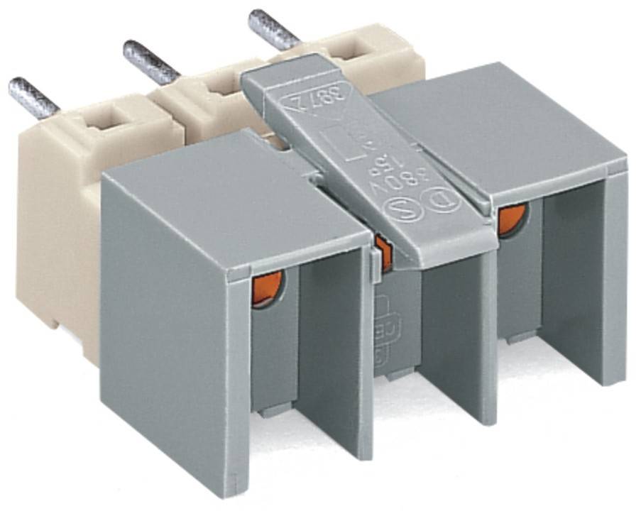 Eine graue und beige elektronische Komponente mit drei Metallstiften, die für elektrische Verbindungen verwendet wird.