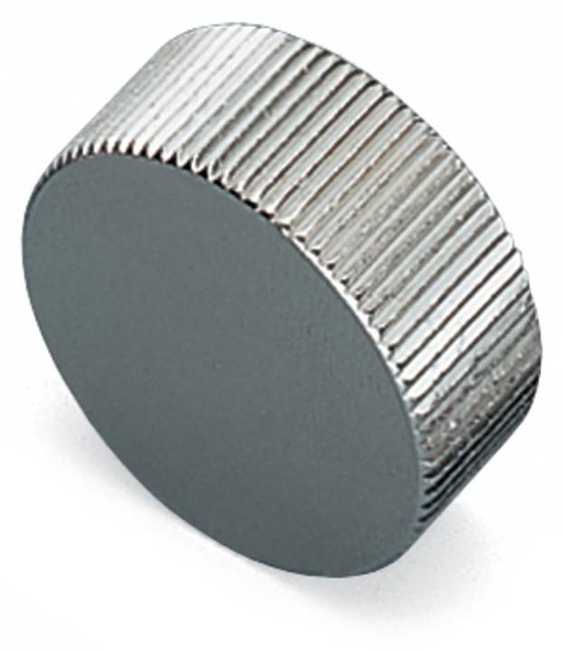 Ein zylindrischer Neodym-Magnet mit gerippter, metallischer Oberfläche, auf seiner Seite liegend.