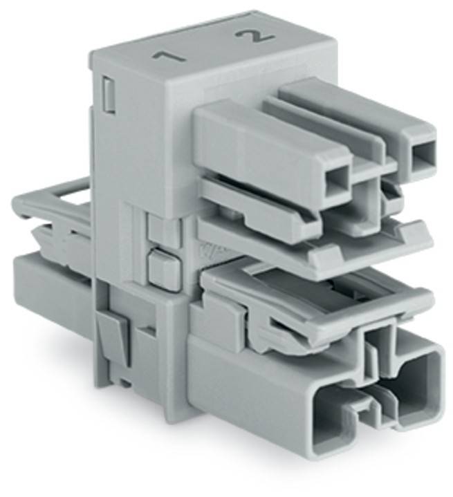 Ein grauer Kunststoff-Verbindungsblock mit beschrifteten Anschlüssen '1' und '2', mit mehreren ineinandergreifenden Abschnitten für elektrische Verbindungen.