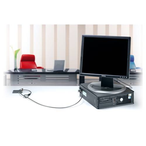 Desktop-Computer-Setup mit einem Dell-Monitor auf einem kleinen PC-Turm, verbunden durch ein Kabel, in einem modernen Büro.