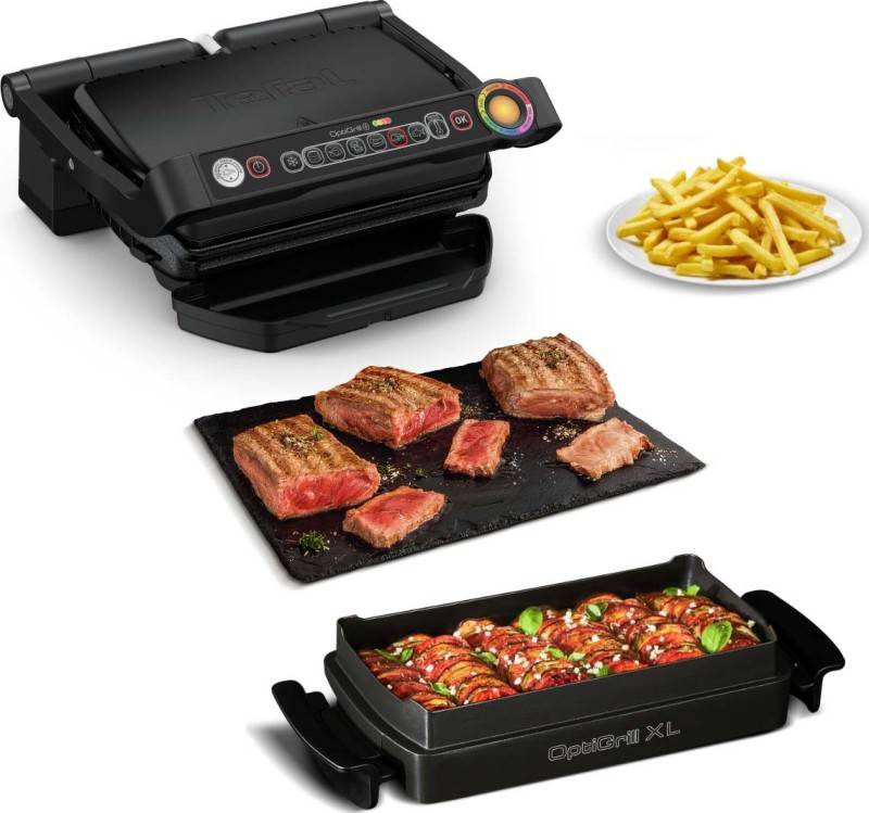 OptiGrill XL' mit gegrillten Steaks, Pommes und Gemüse auf einem schwarzen Tablett, das die Kochfähigkeiten und Mahlzeitenvielfalt demonstriert.