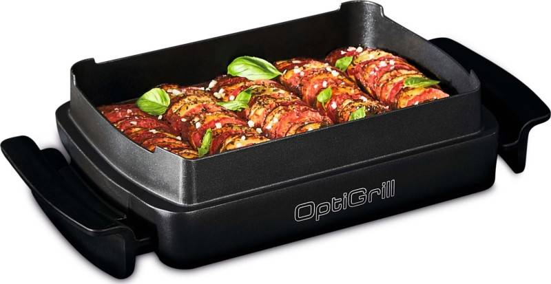 Ein gegrilltes Gemüsegericht mit Tomaten, Zucchini und Kräutern auf einem schwarzen OptiGrill, garniert mit Basilikum, das leuchtende Farben und frische Zutaten präsentiert.