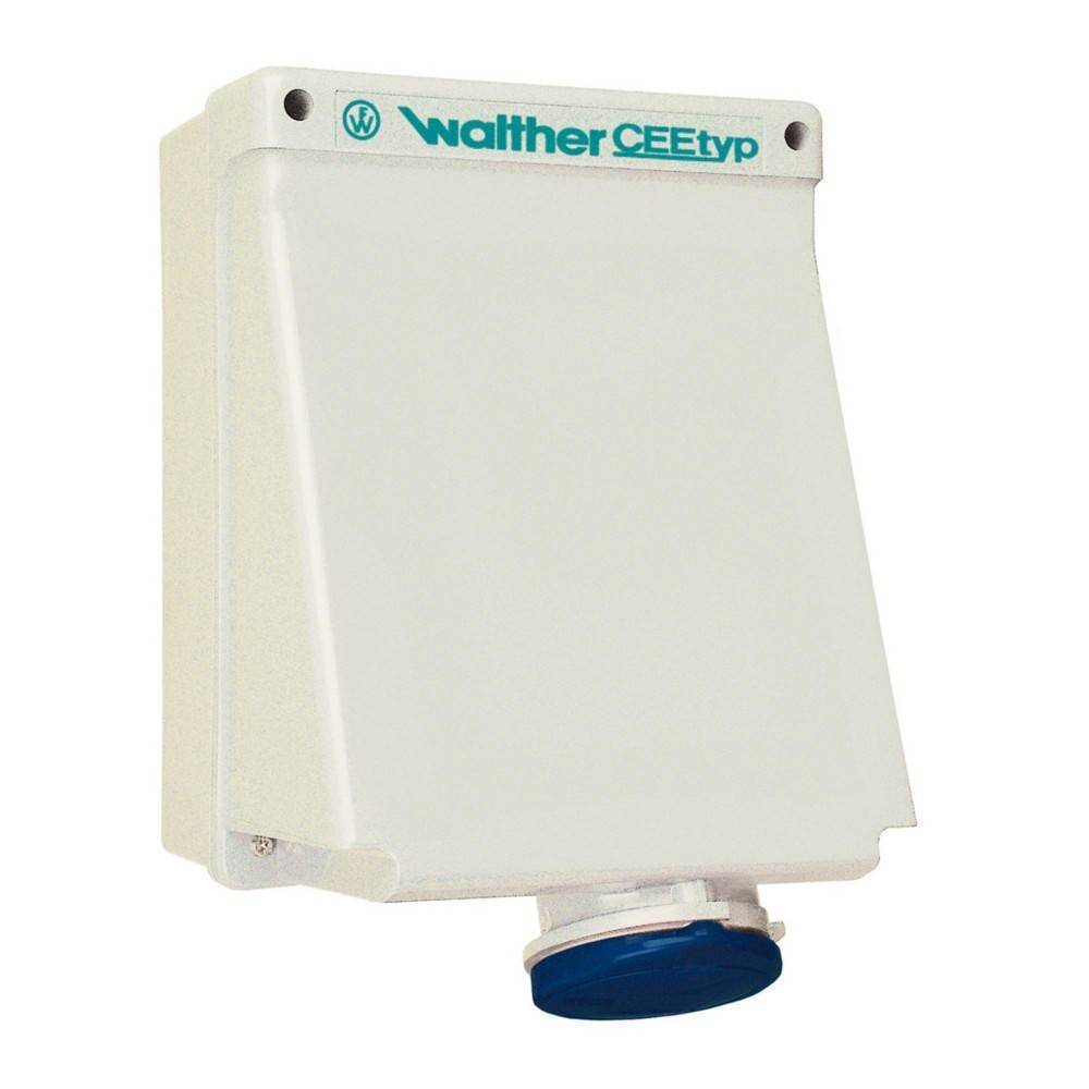 Eine weiße Walther CEEnorm Elektroverteilerdose mit einer blauen runden Abdeckung am Boden, für den Außeneinsatz konzipiert, auf der der Markenname sichtbar ist.
