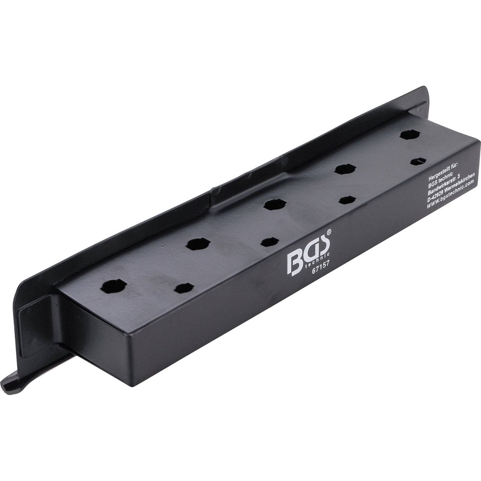 Ein schwarzer Werkzeugorganizer mit sechs sechseckigen Fächern, beschriftet mit ‚BGS 67157', verwendet zum Aufbewahren und Organisieren von Steckschlüsseln.