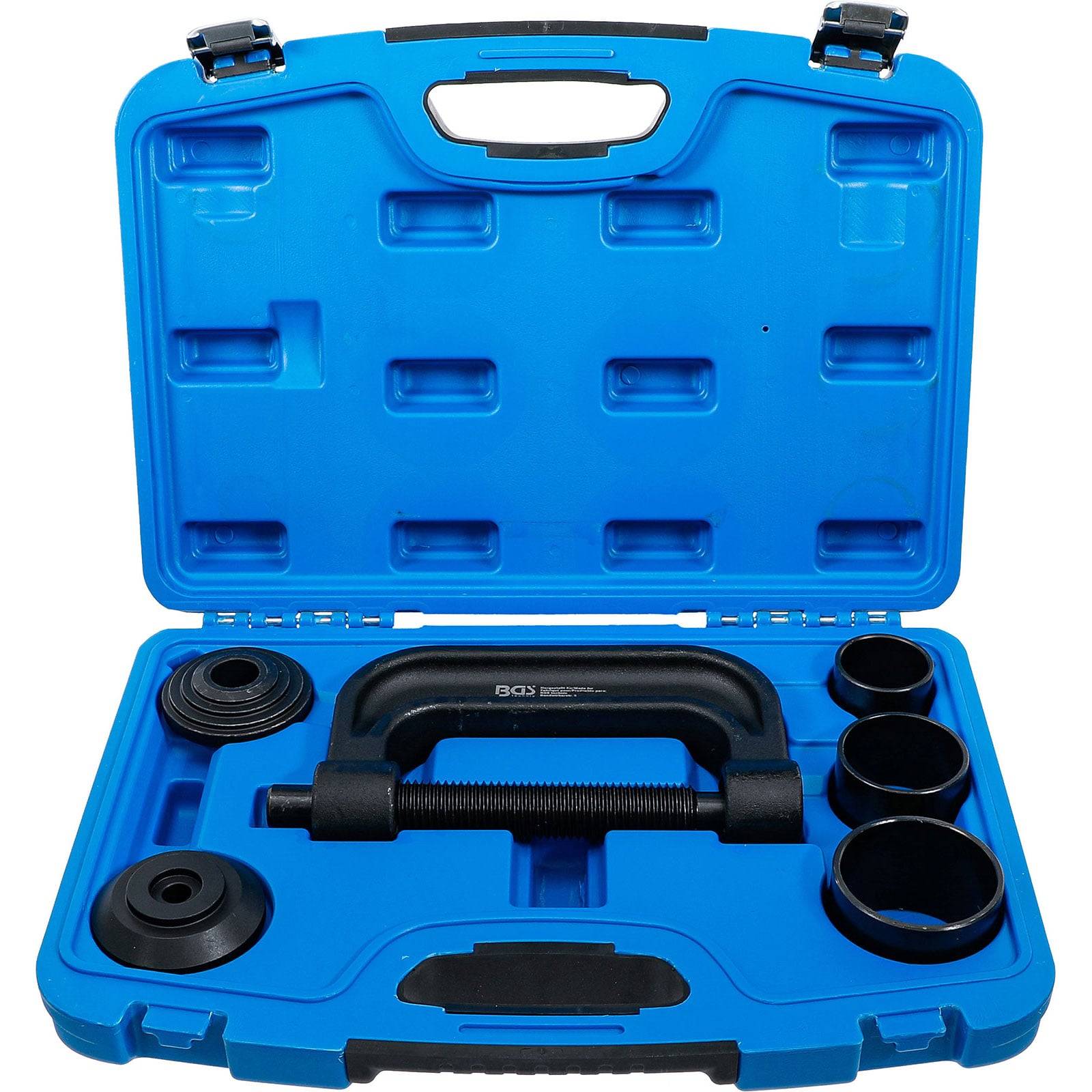 Eine blaue Plastikbox, geöffnet und eine Kugelgelenk-Servicewerkzeug-Ausrüstung präsentierend, die verschiedene Anbauteile und eine Presse umfasst, die für Automobilwartung verwendet wird.