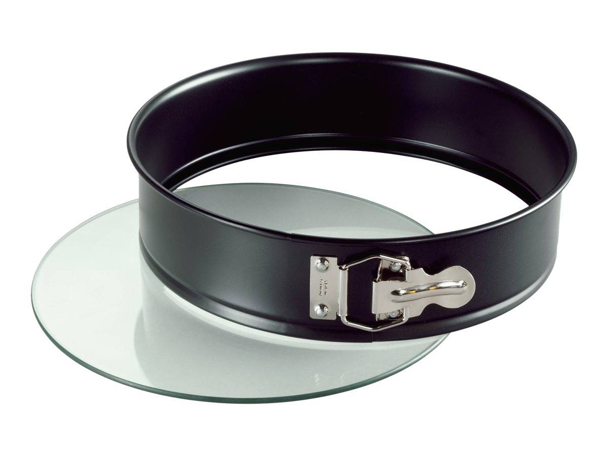 Eine schwarze runde Springform mit silberner Verschlussvorrichtung ist auf einer runden Glaskuchen offen und eignet sich zum Backen und Servieren von Kuchen.