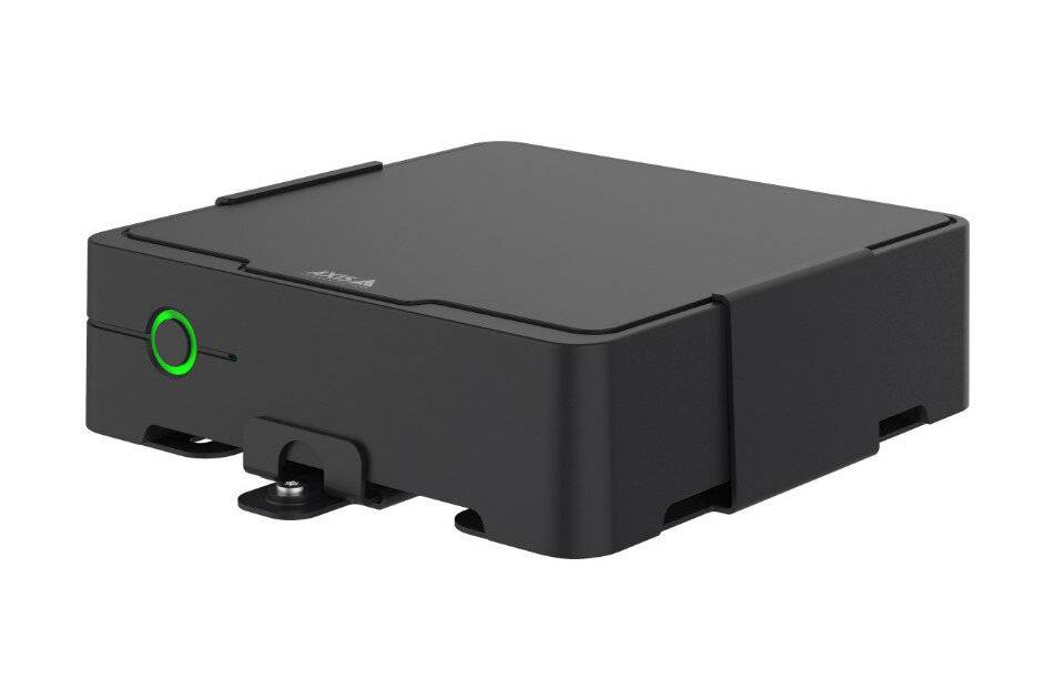 Schwarzes kompaktes elektronisches Gerät mit grün umrandetem Netzschalter an der Vorderseite und oben angebrachtem Verschluss auf weißem Hintergrund.