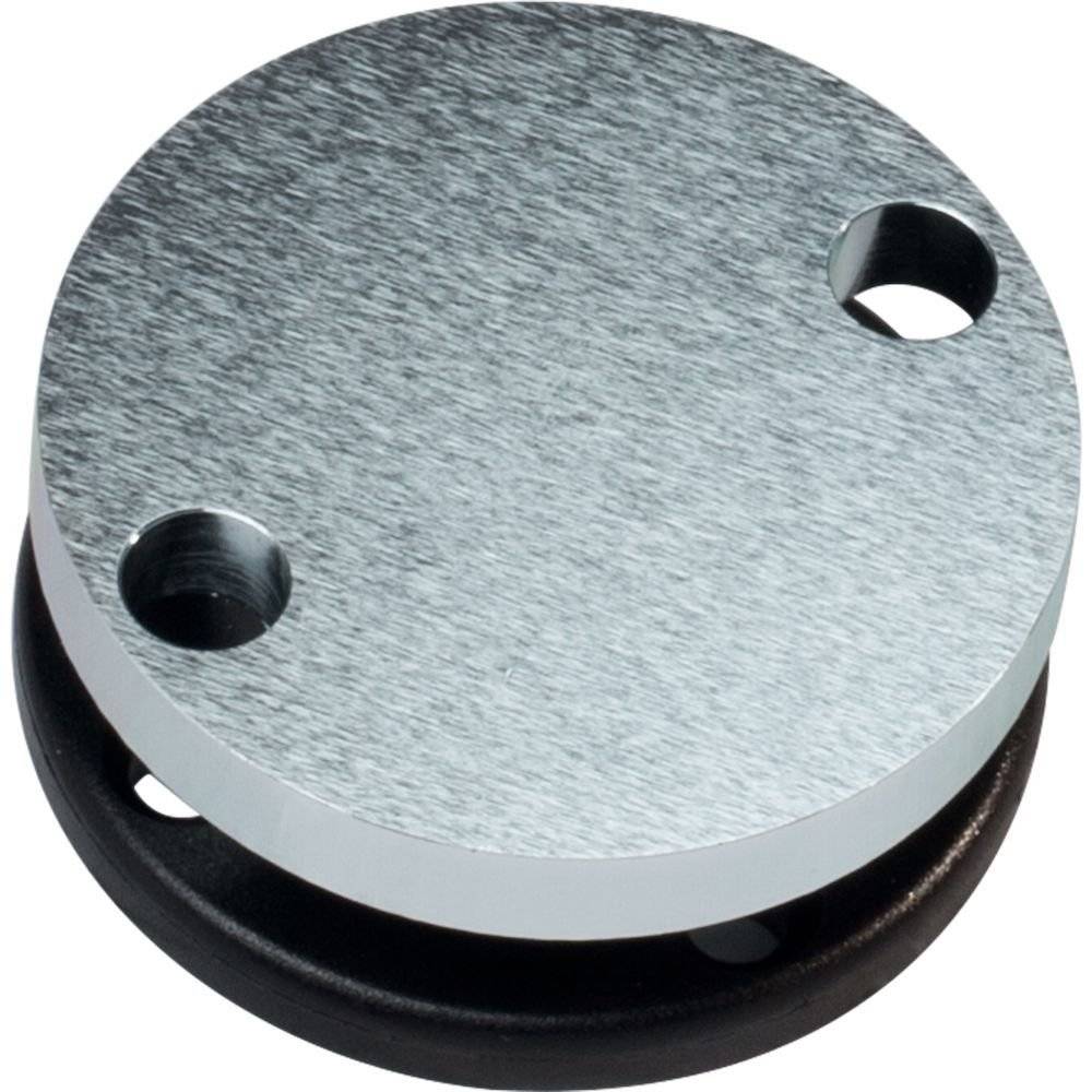 Eine runde Metallscheibe mit zwei kreisförmigen Löchern, auf einer schwarzen Basis positioniert. Die Oberfläche hat eine gebürstete Textur.