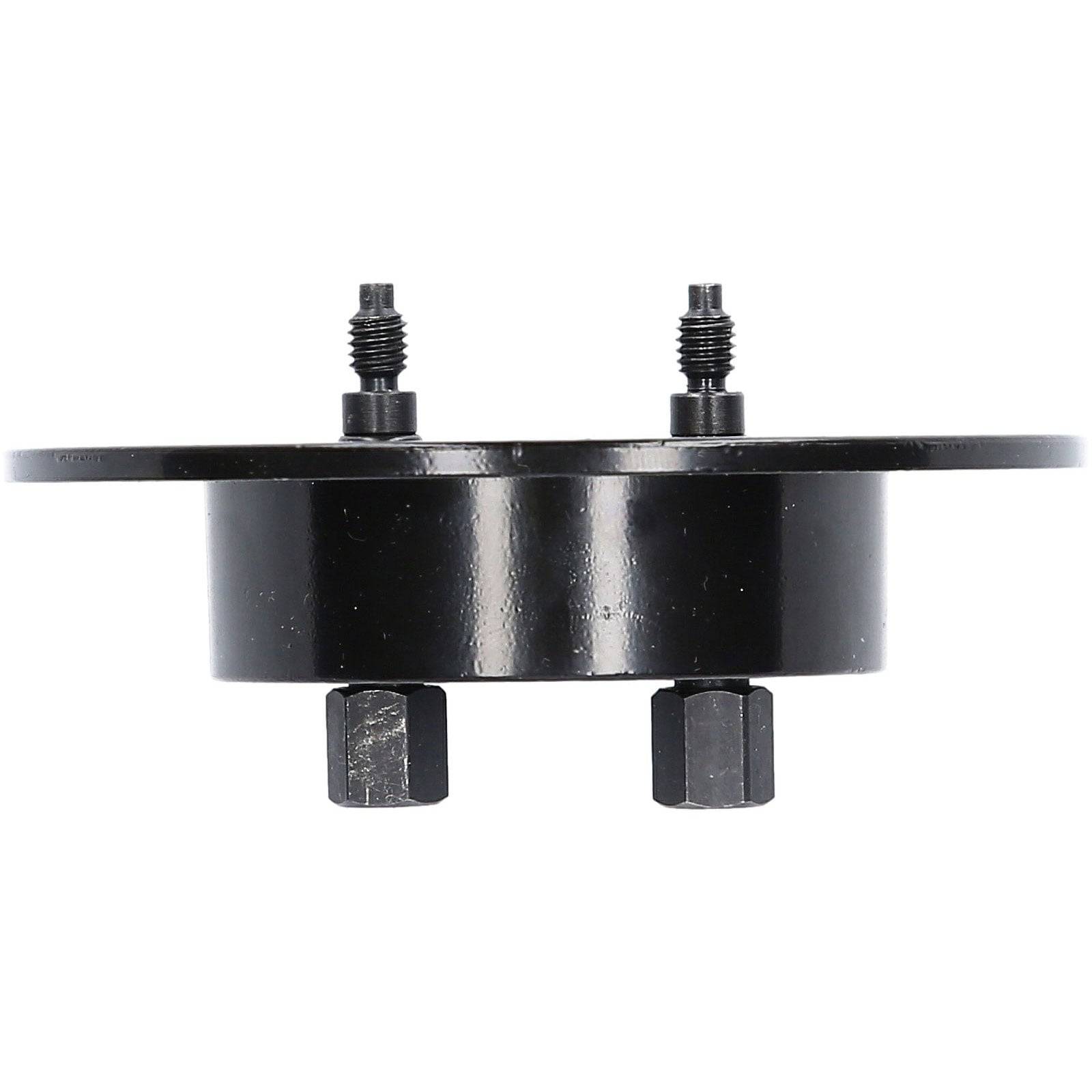 Eine schwarze Metallkomponente mit zwei Schrauben oben und zwei sechseckigen Vorsprüngen unten, wahrscheinlich für Bau- oder Montagezwecke verwendet.