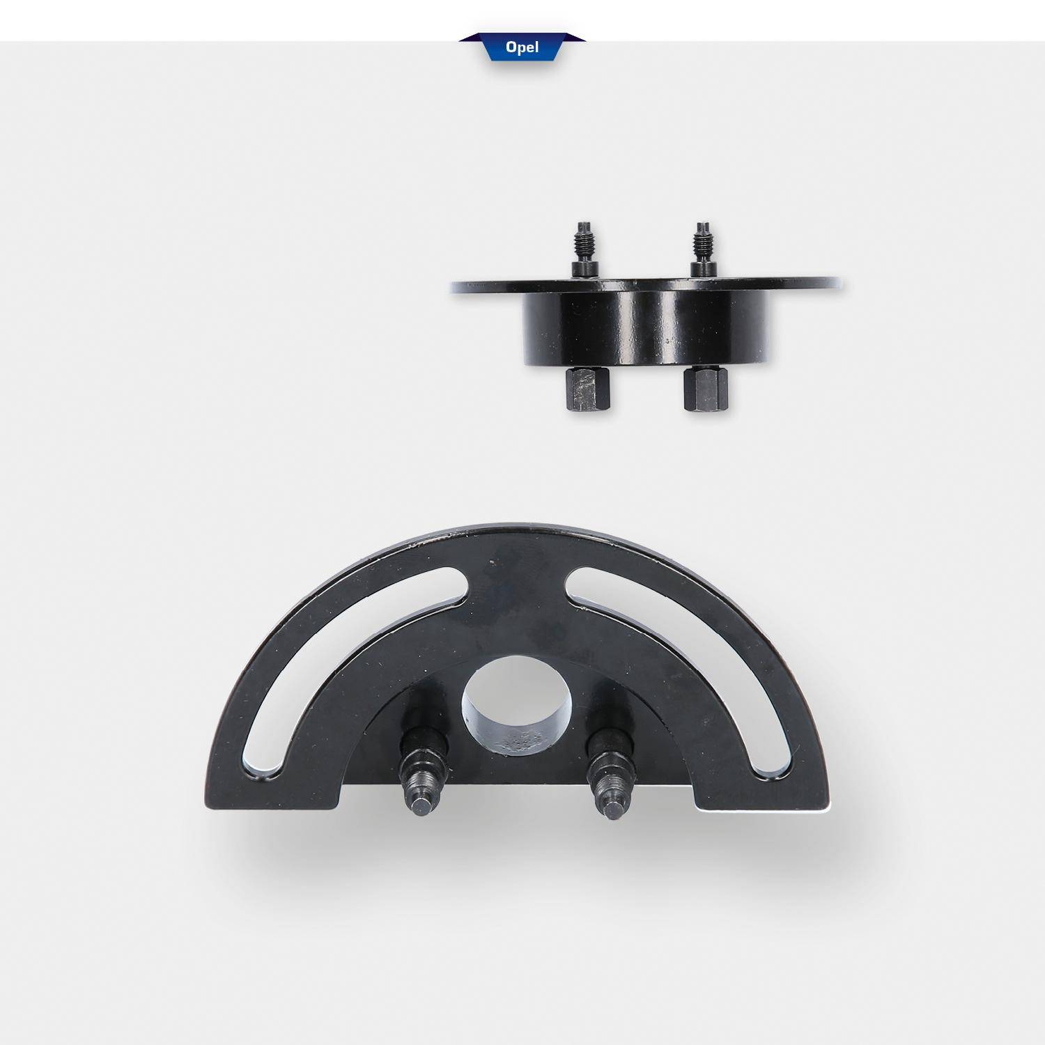 Zwei schwarze Automobil-Metallwerkzeuge oder Adapter auf weißem Hintergrund, eines U-förmig und eines rund mit Bolzen.
