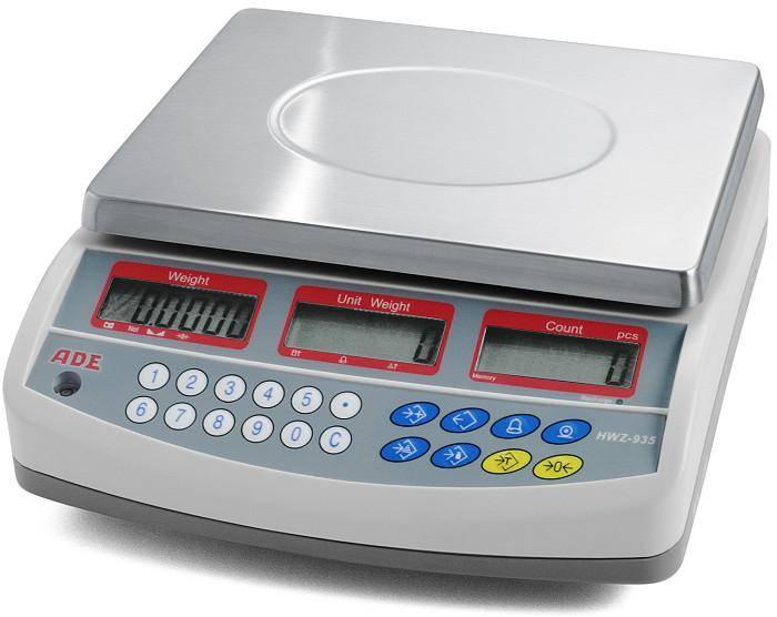 Digitale Waage mit Edelstahlplattform, drei roten LED-Anzeigen für Gewicht, Einheitsgewicht und Anzahl sowie Tastaturbedienung.